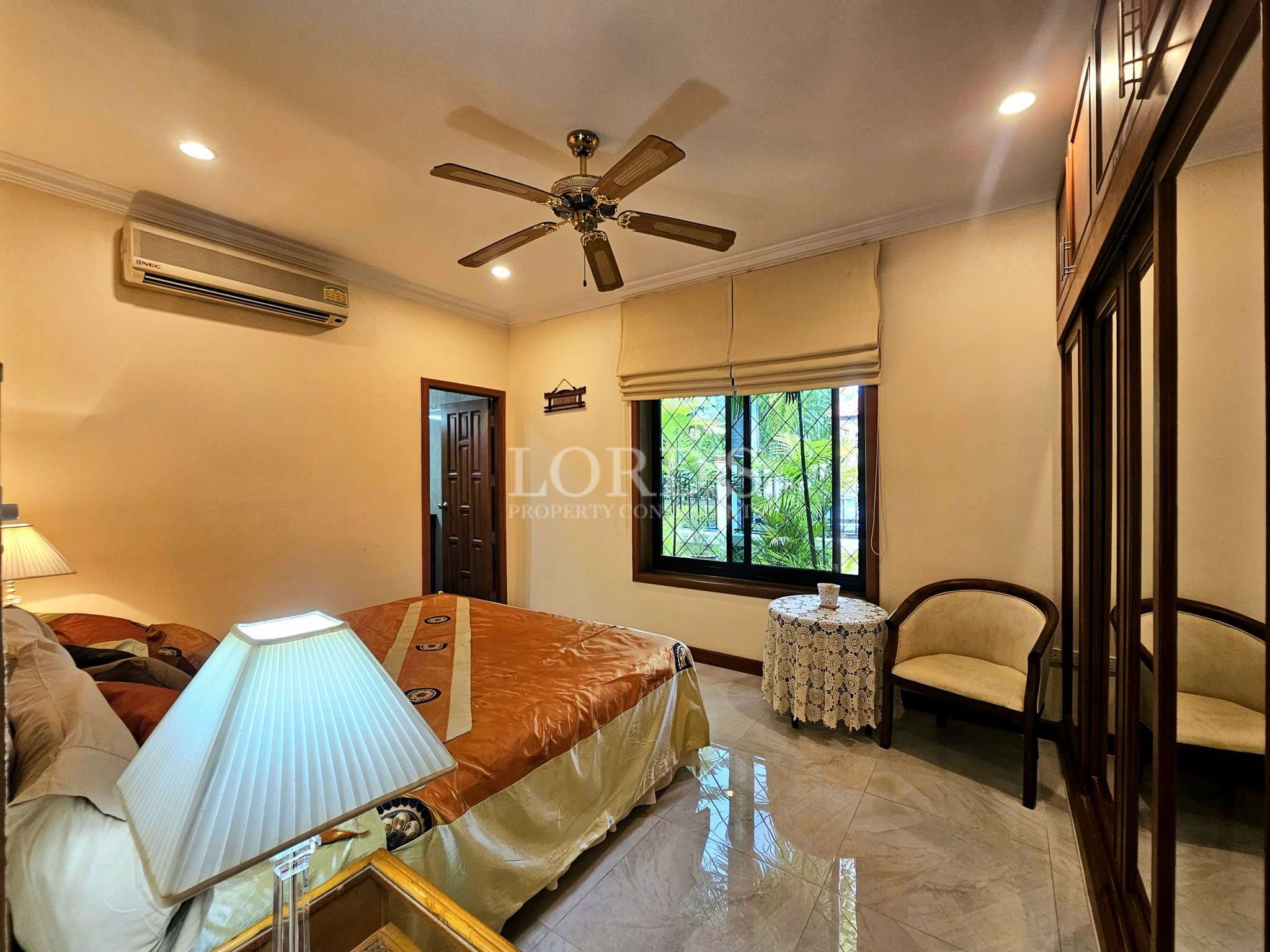 Cozy bedroom with natural light.