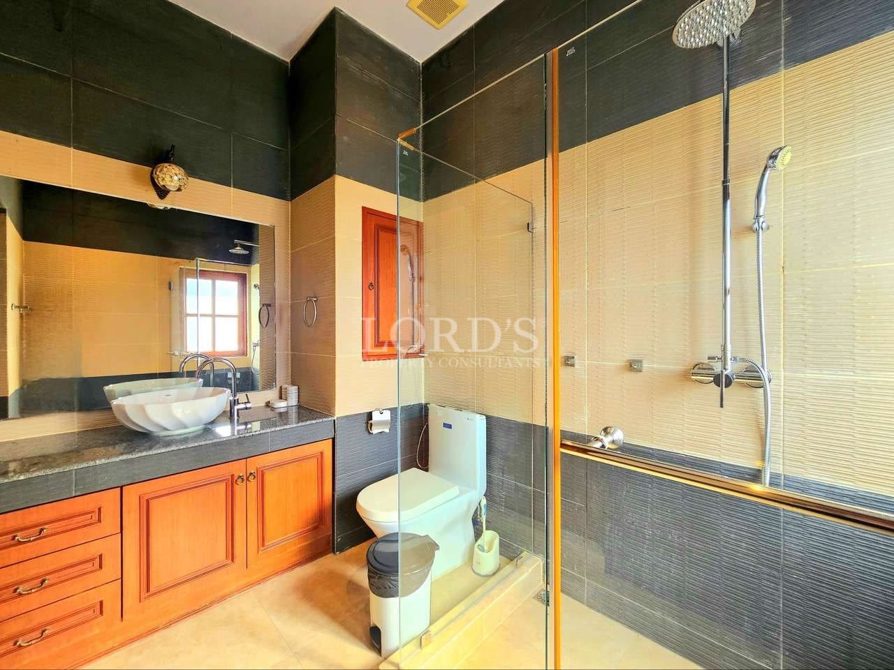 Modern bathroom with glass shower enclosure