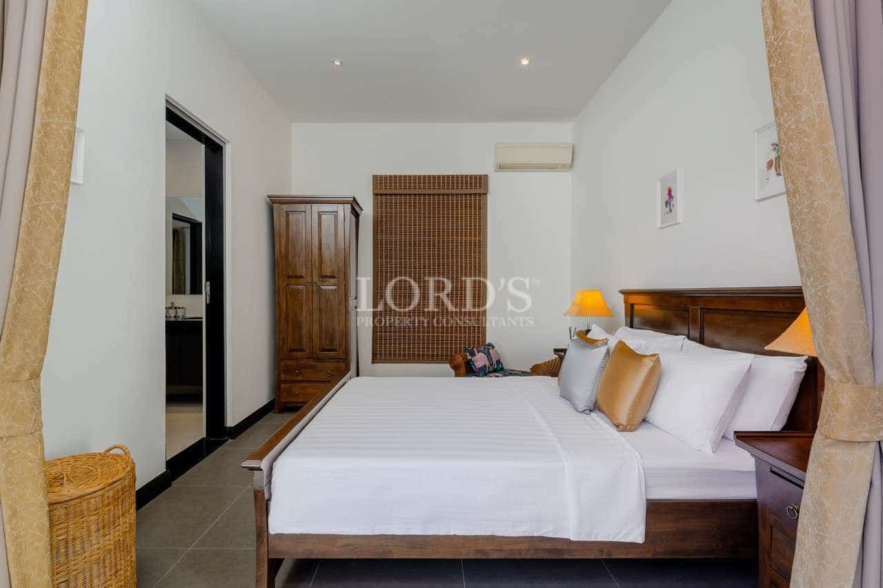 Modern bedroom with wooden furniture