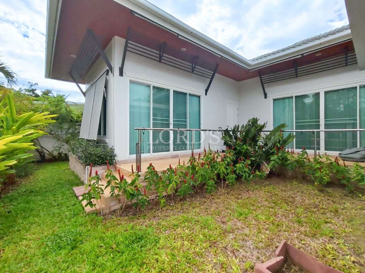 Modern house with garden and patio