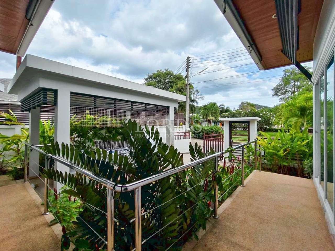 Modern architecture with lush greenery.