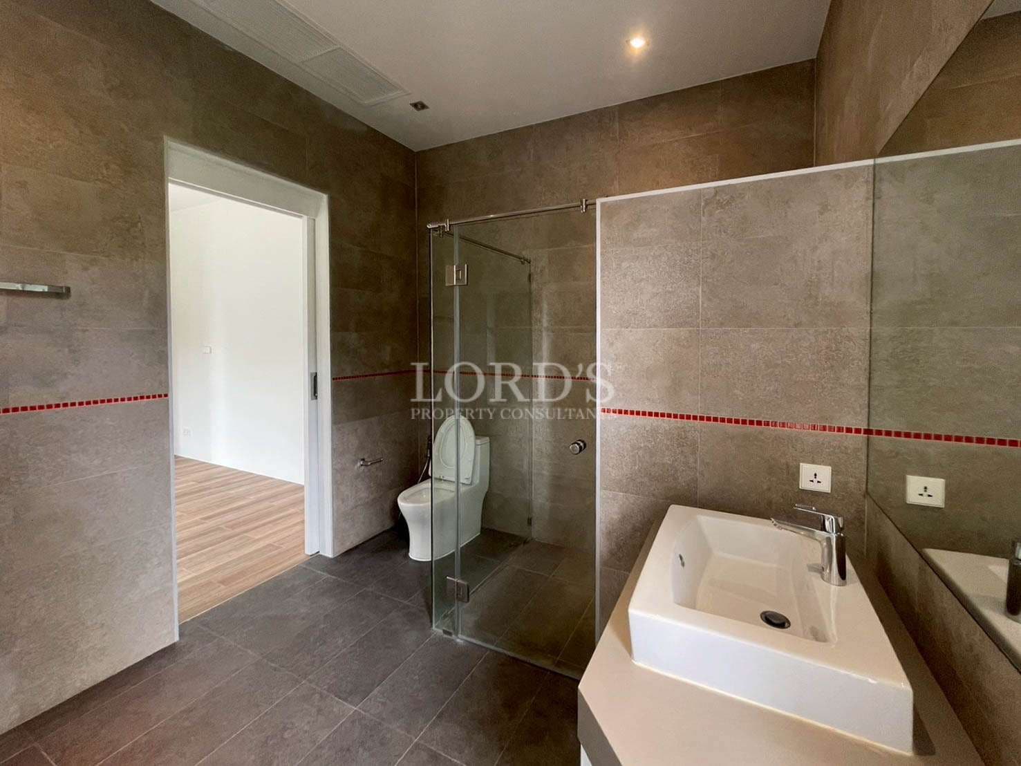 Empty room with wooden flooring