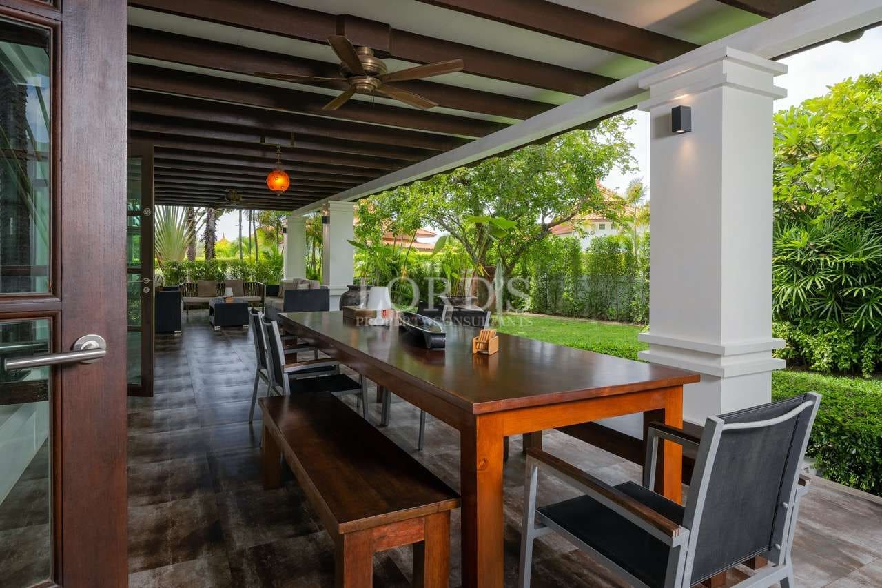 Spacious outdoor dining area with greenery