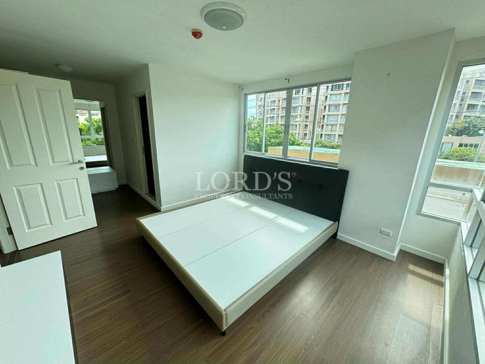 Empty modern bedroom with natural light