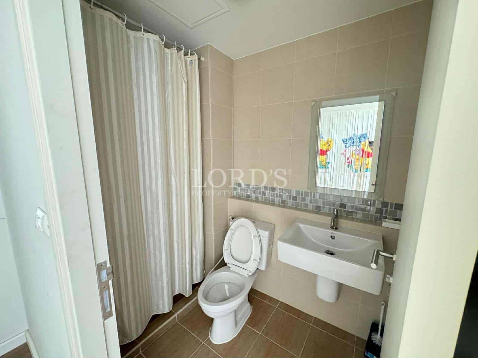 Modern bathroom with shower and toilet