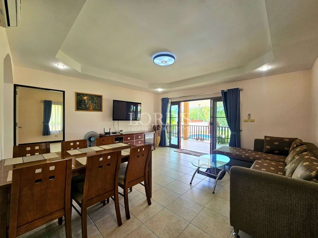 Spacious living room with dining area