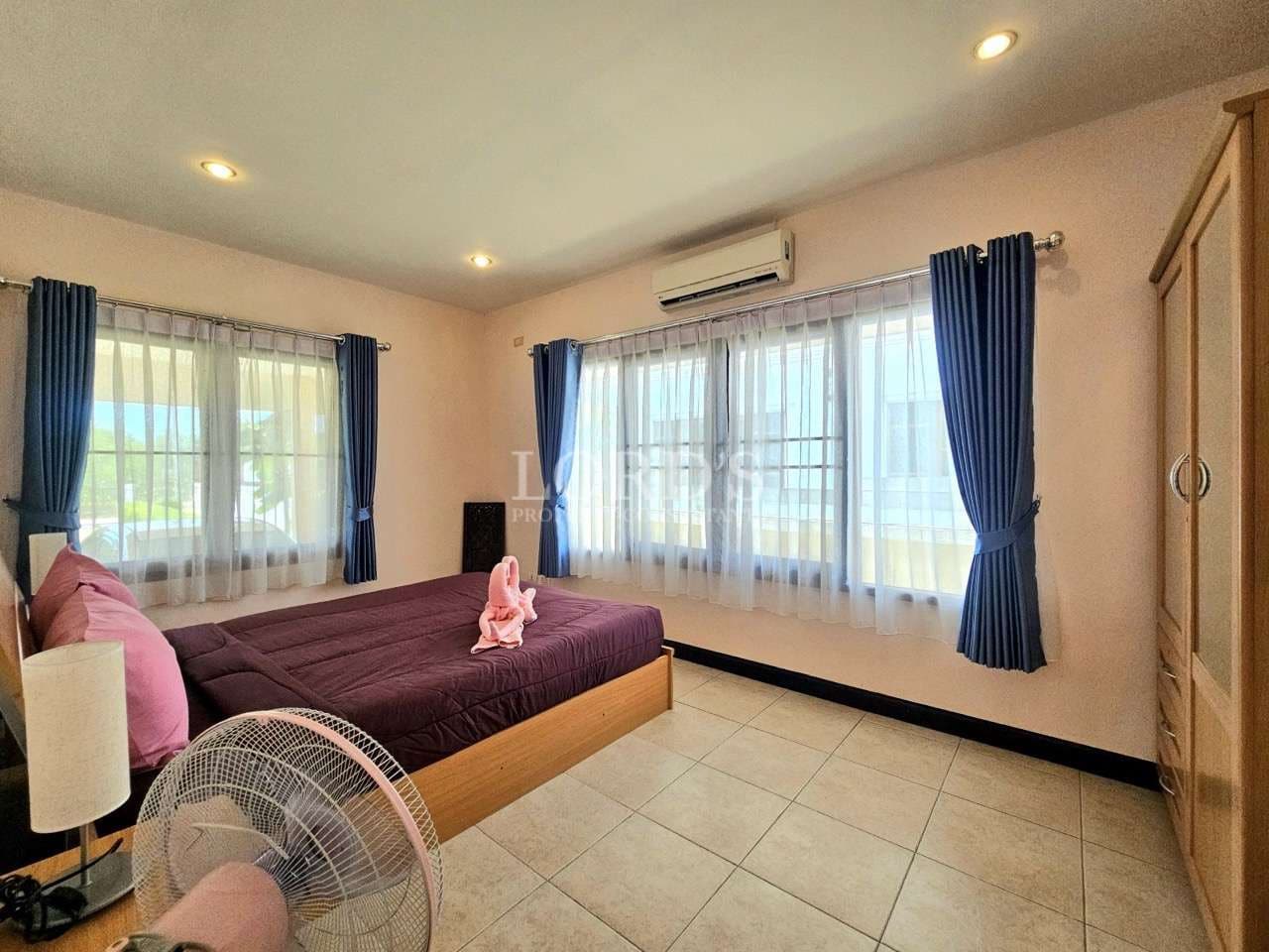Spacious bedroom with natural light