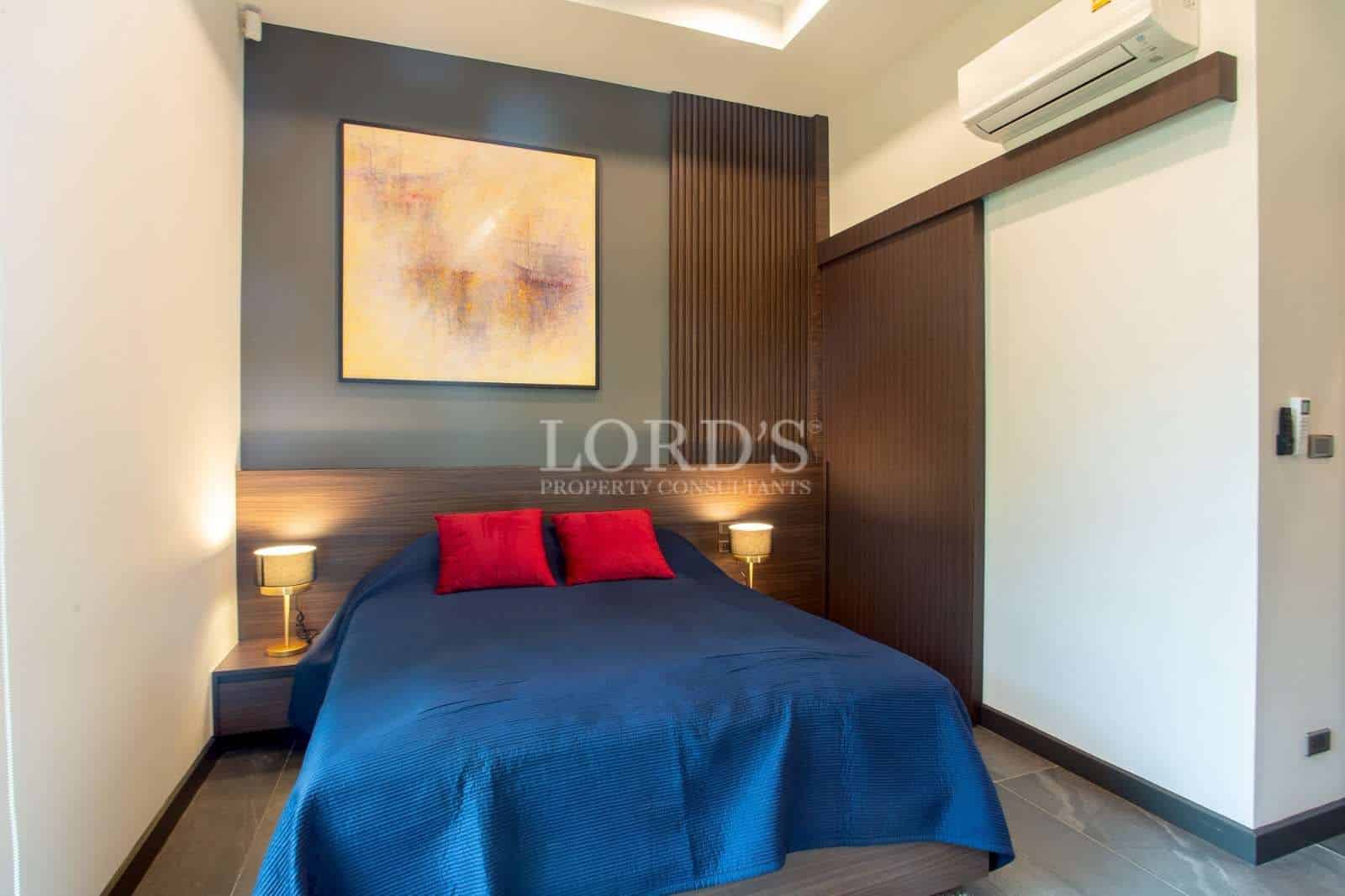 Cozy bedroom with modern decor.