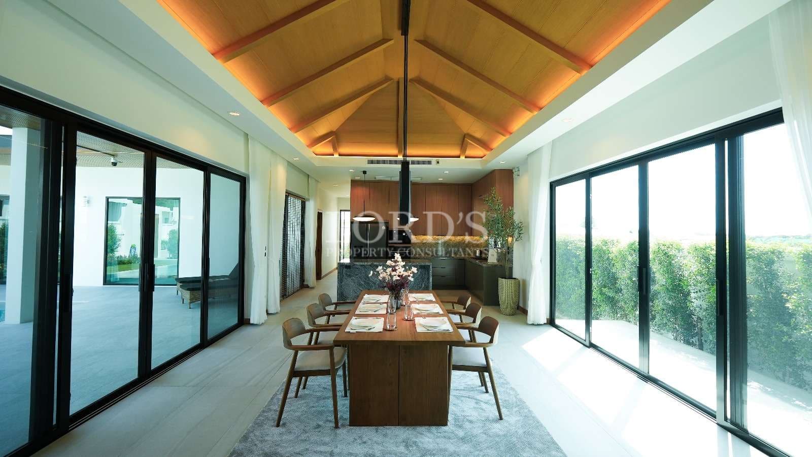 Modern dining room with large windows