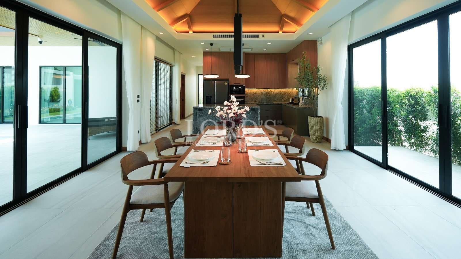Modern dining room with large windows