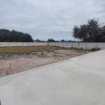 Empty lot with surrounding trees