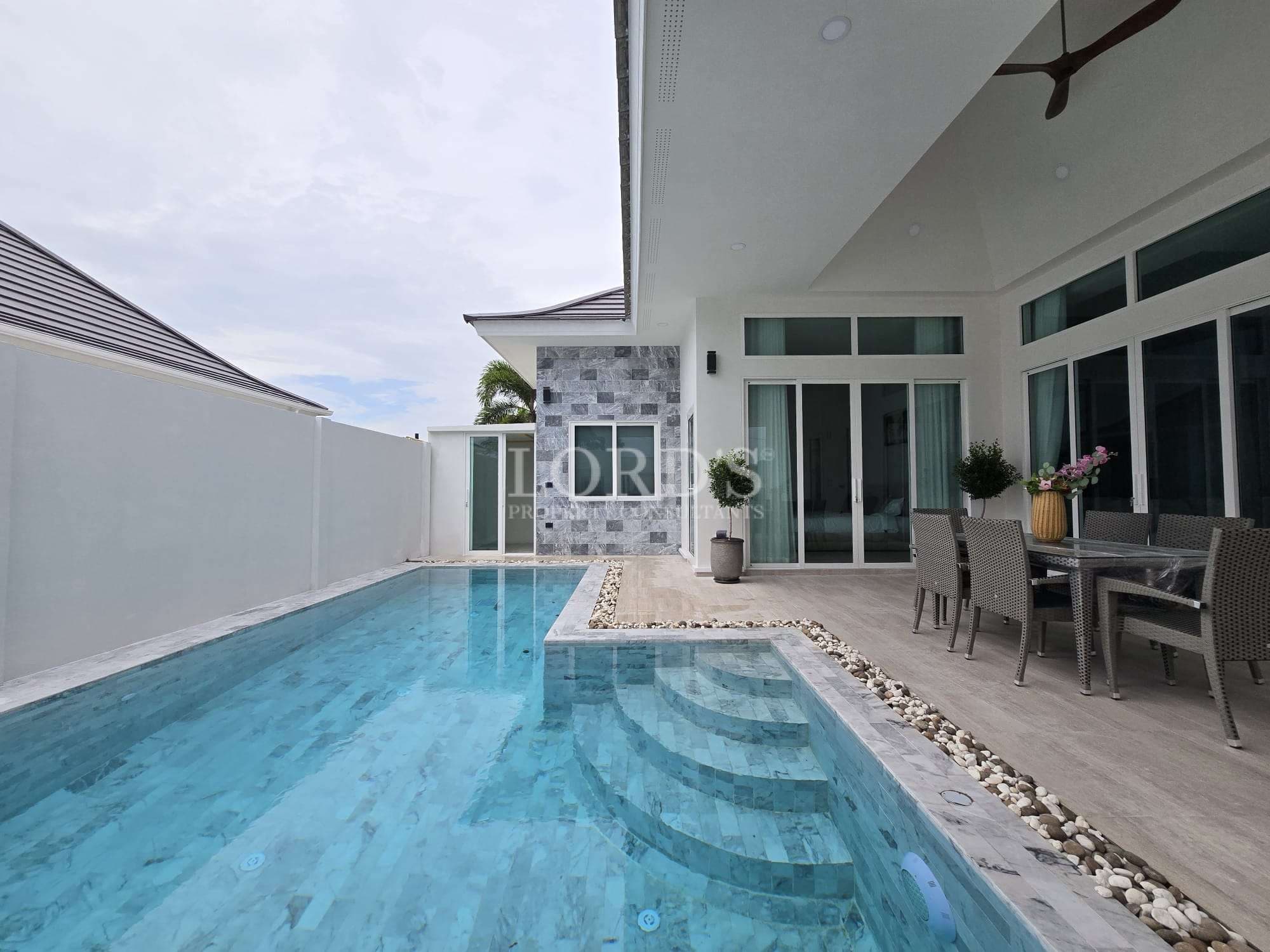 Modern villa with pool and patio