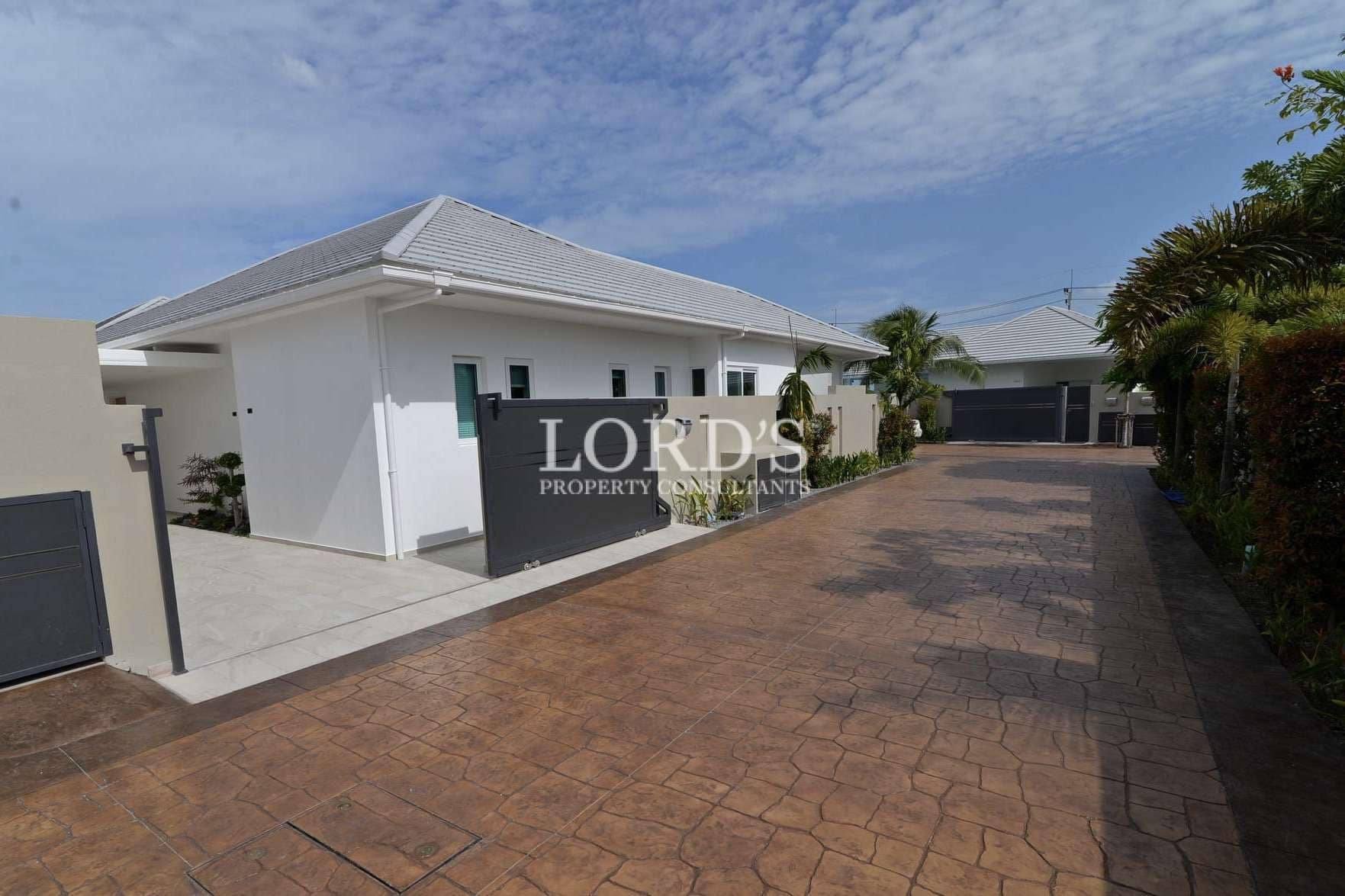 Modern house with paved driveway