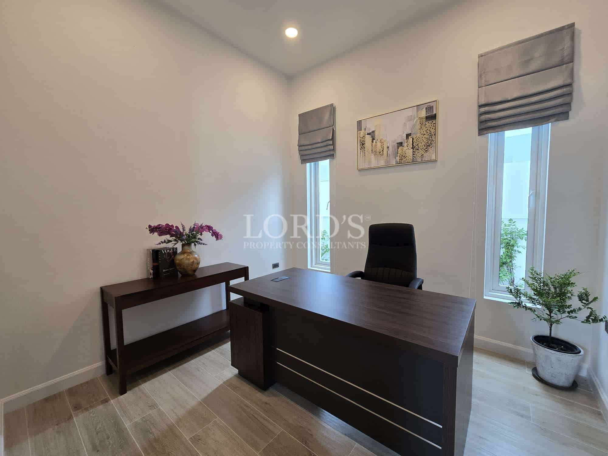 Modern office with desk and plants