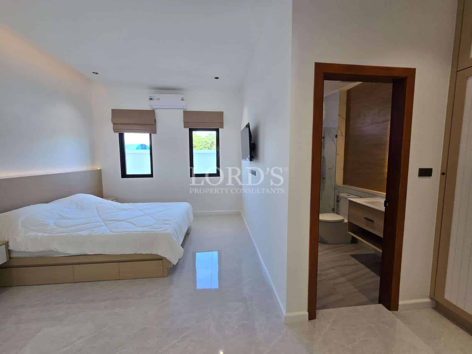 Modern bedroom with attached bathroom