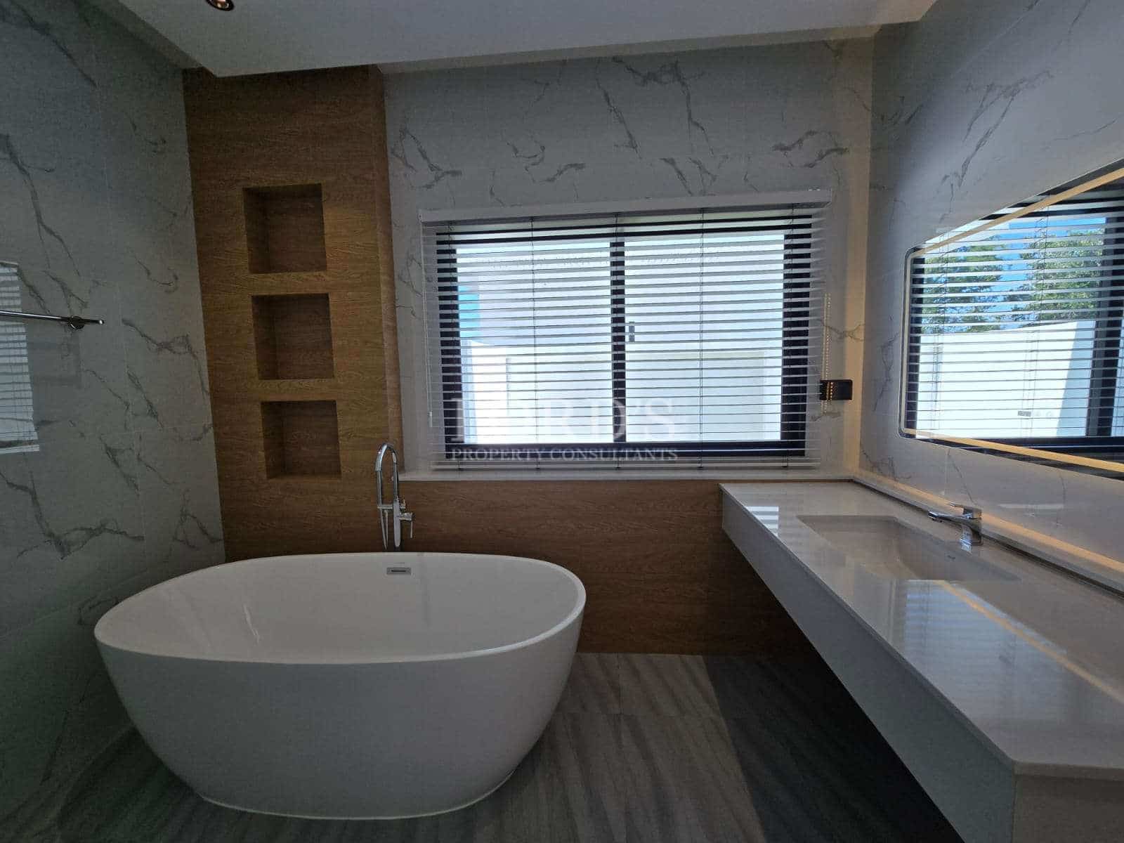 Modern bathroom with bathtub and sink