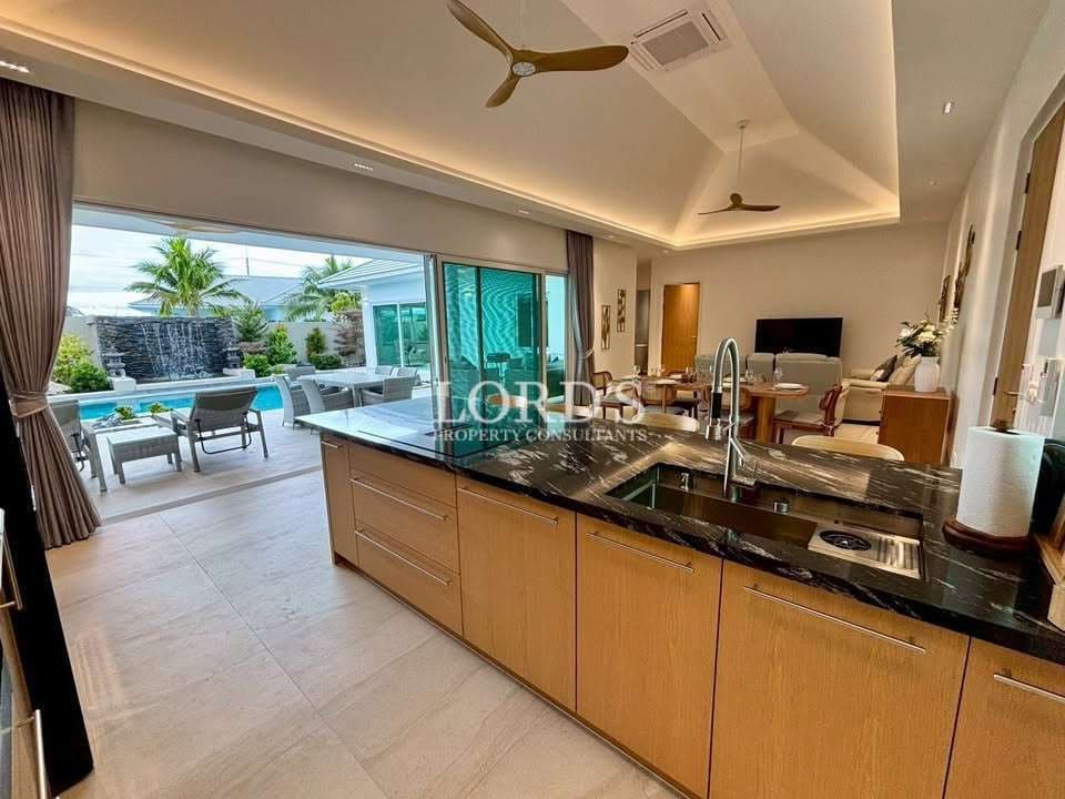 Modern kitchen with pool view