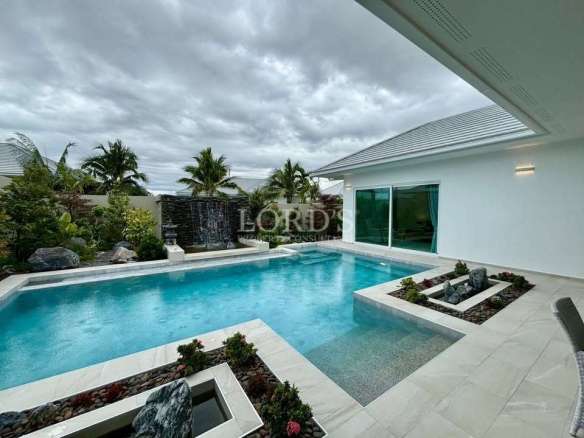 Modern villa with pool and landscaping