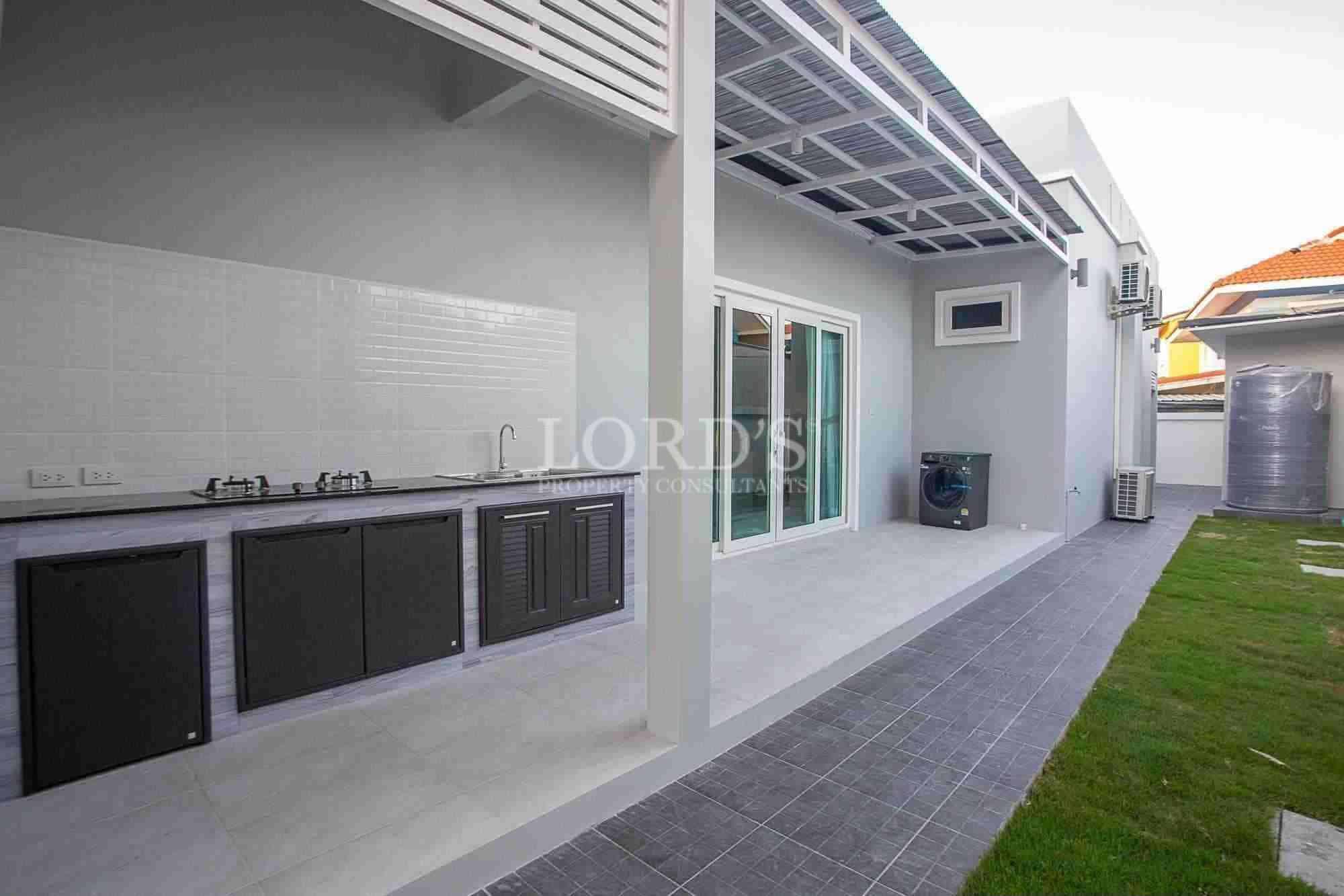 Modern outdoor kitchen with patio