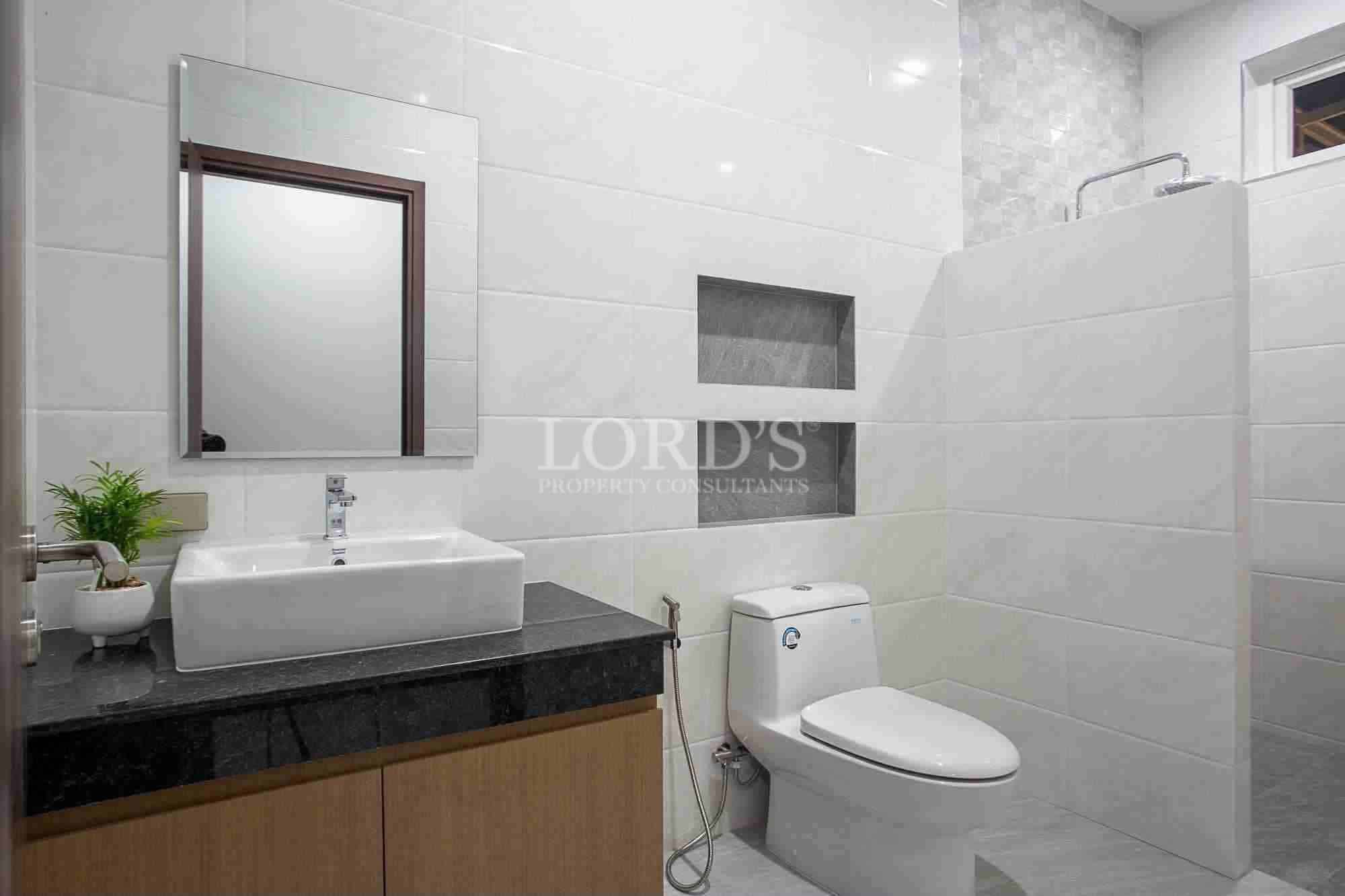 Modern bathroom with sink and toilet