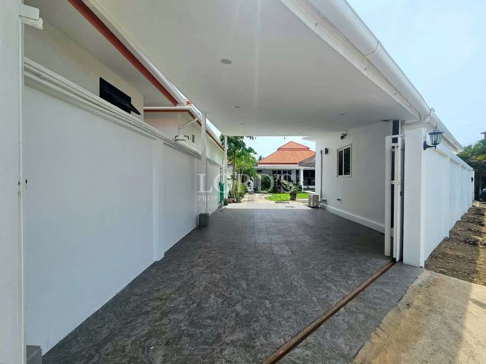 Empty carport with tiled flooring