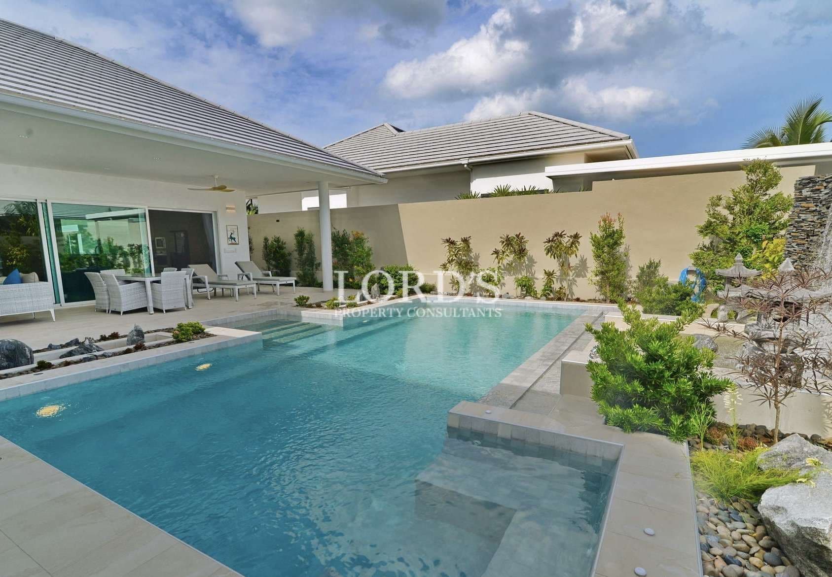 Modern pool with landscaped surroundings