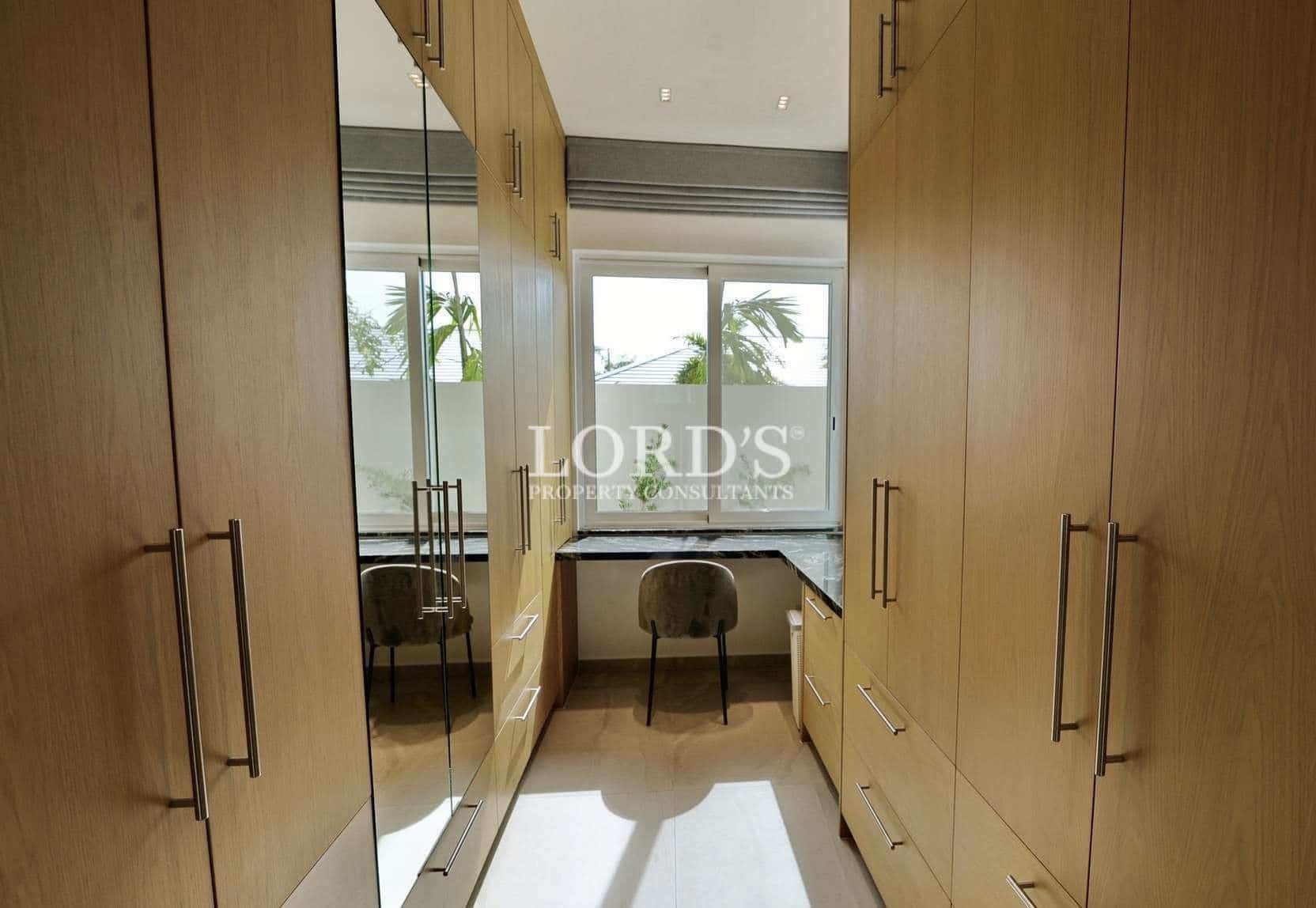 Modern room with wooden cabinets.