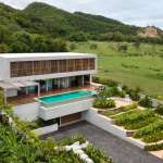 Modern house with pool and greenery