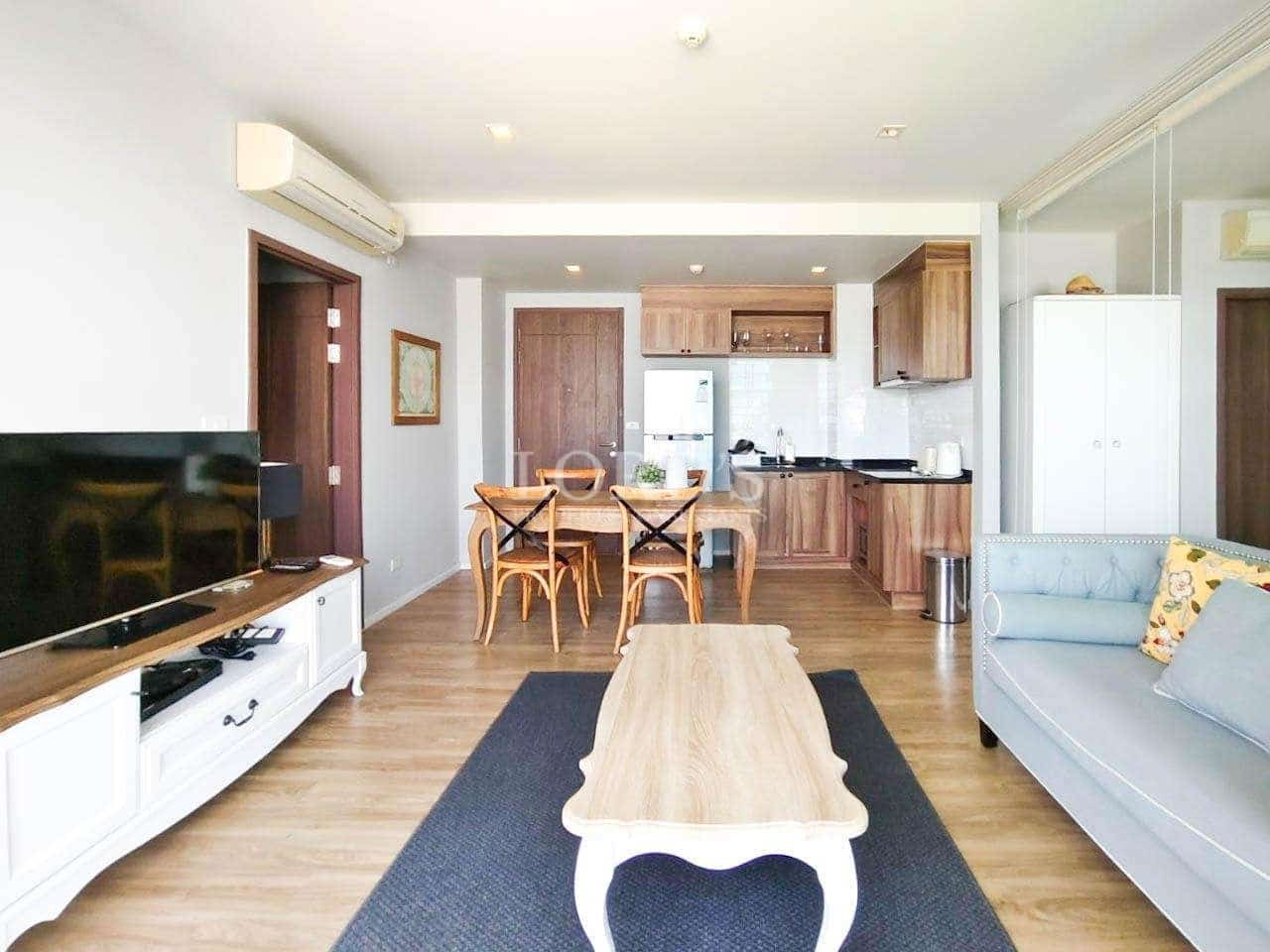 Modern living room with kitchen area