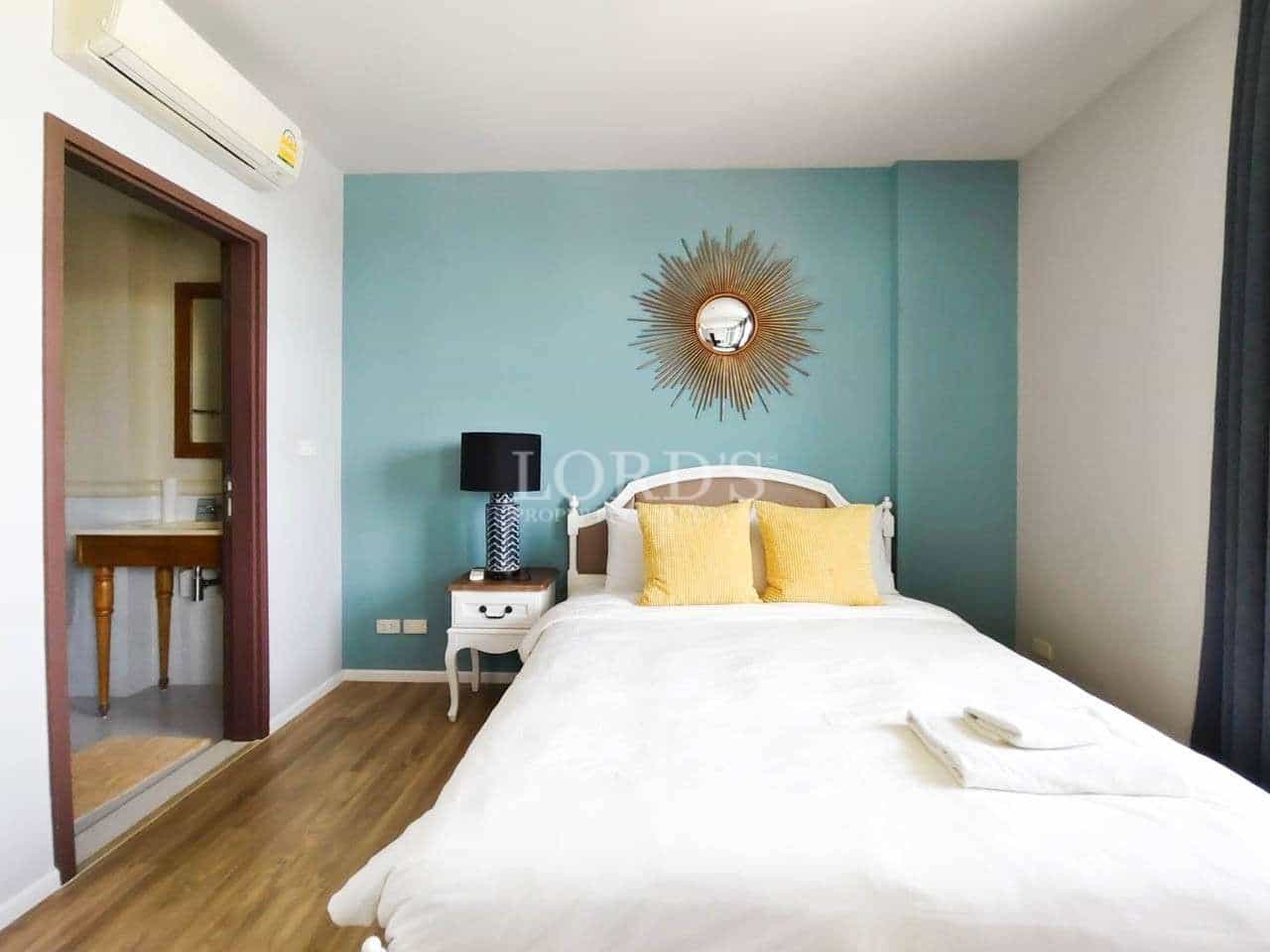 Cozy bedroom with modern decor.