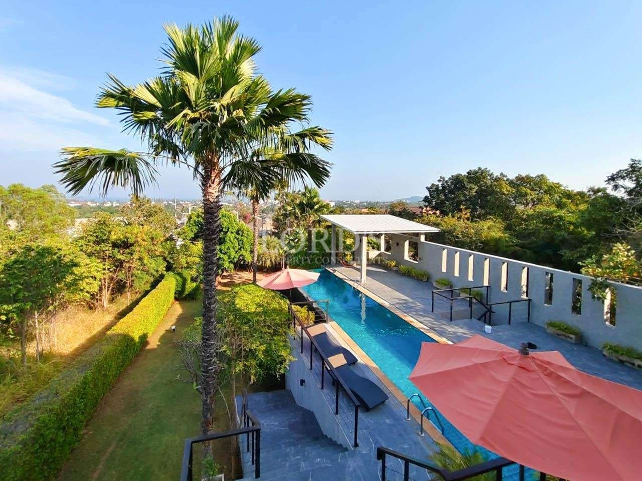 Tropical poolside with palm trees