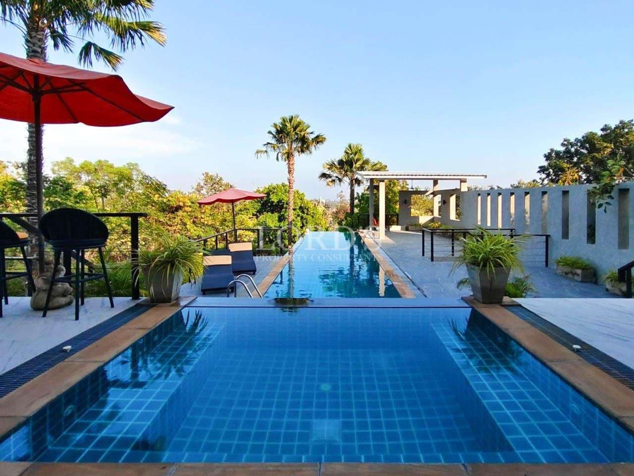 Serene pool with tropical surroundings