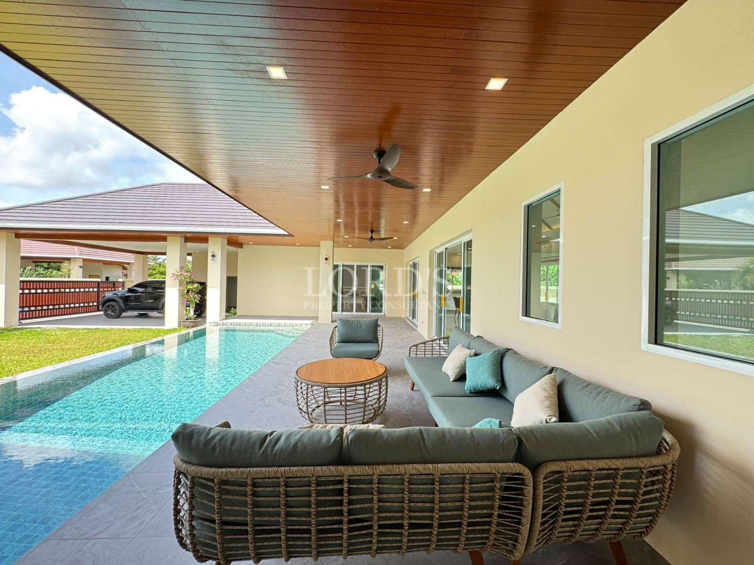 Modern patio with pool view