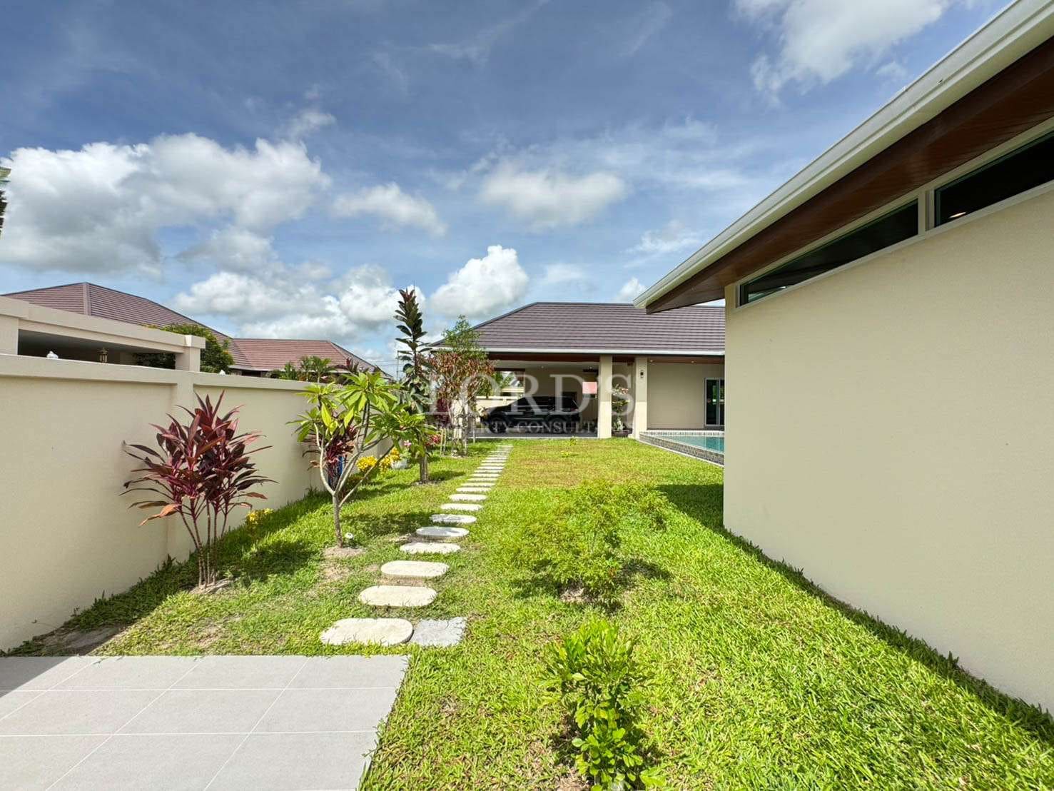 Pathway leading to modern house