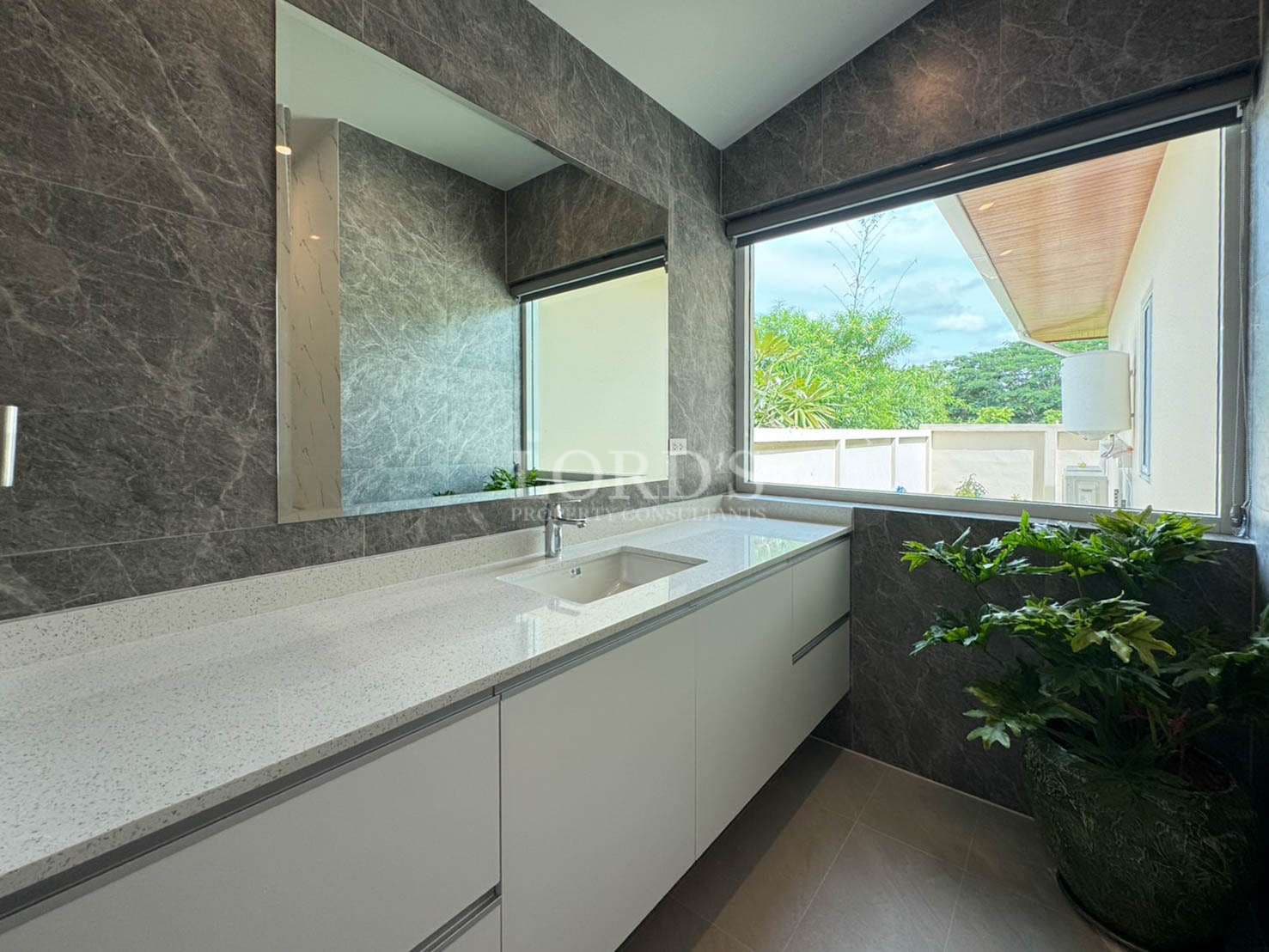 Modern bathroom with large window