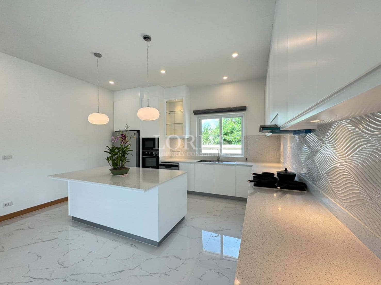 Modern kitchen with white cabinetry