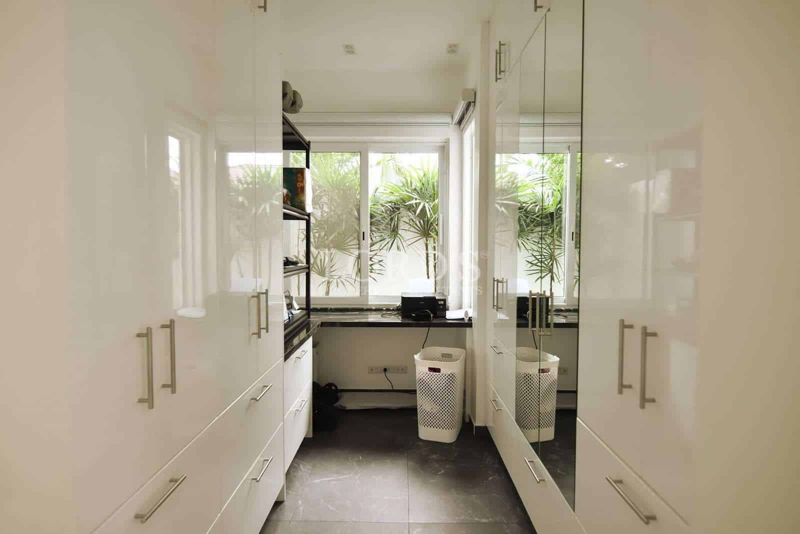 Modern kitchen with white cabinets