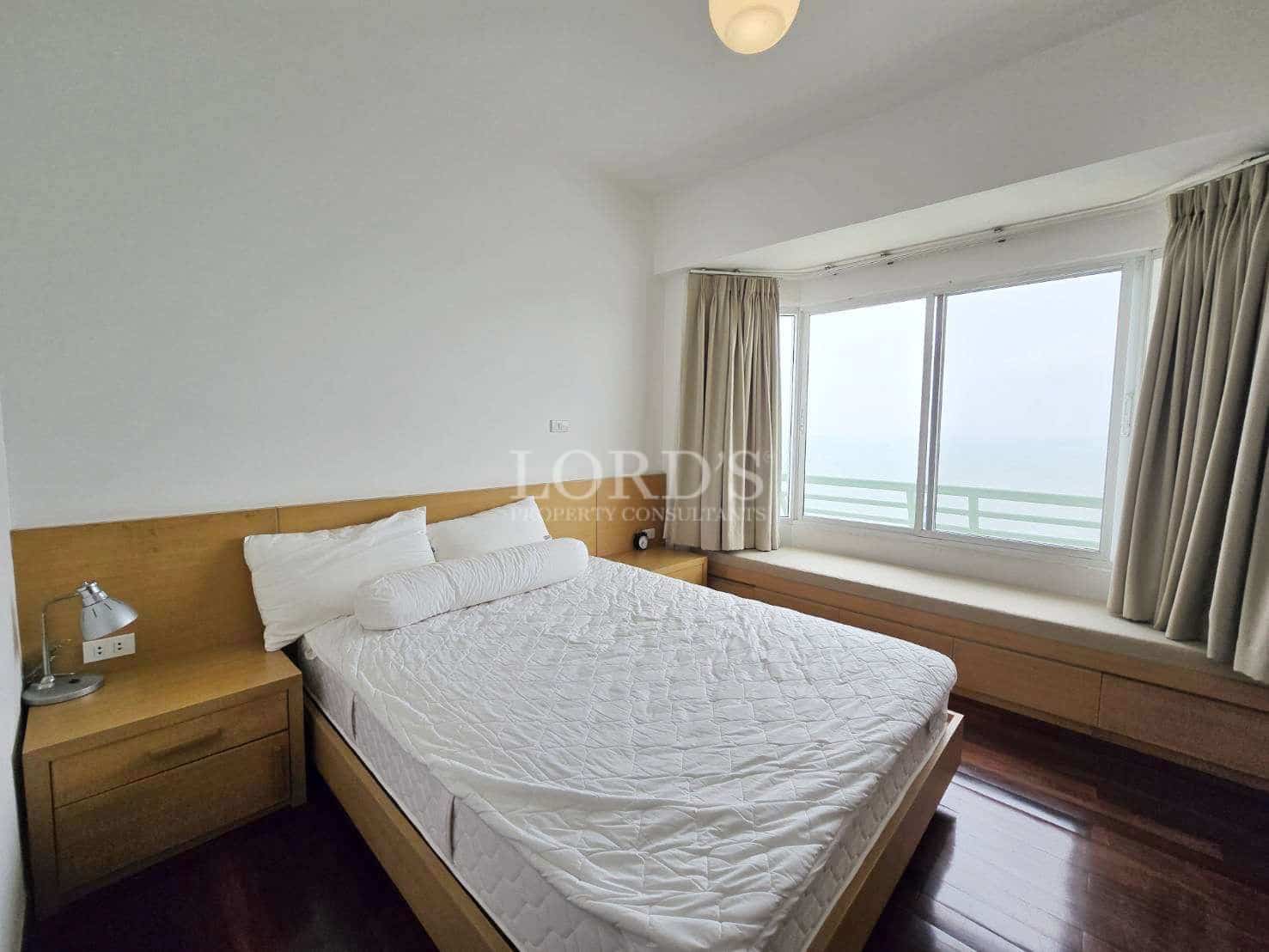 Coastal view with mountain backdrop.