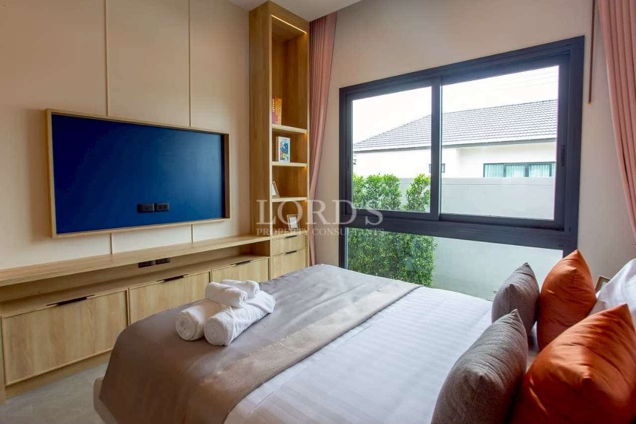 Modern bedroom with large window