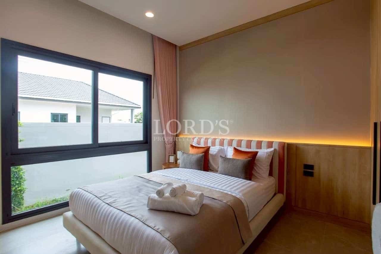 Modern bedroom with large window