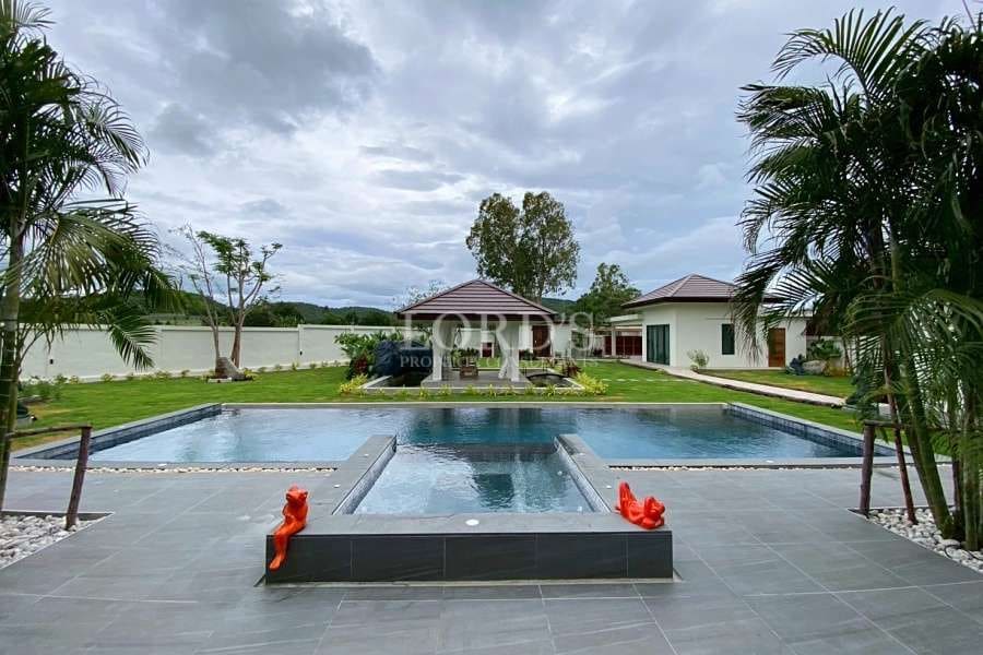 Luxury pool with landscaped garden