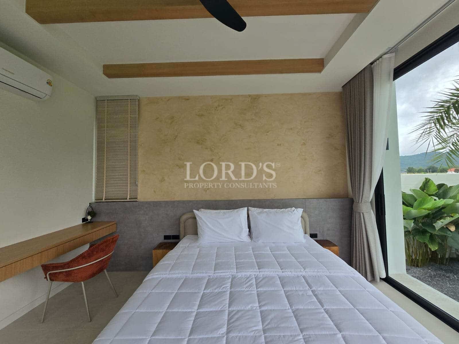 Modern bedroom with large window