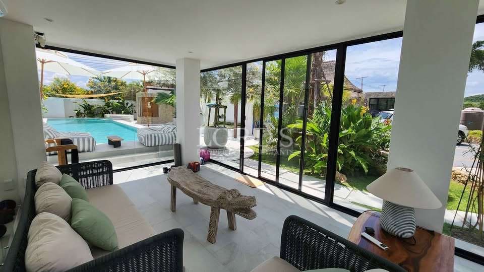 Modern living room with pool view