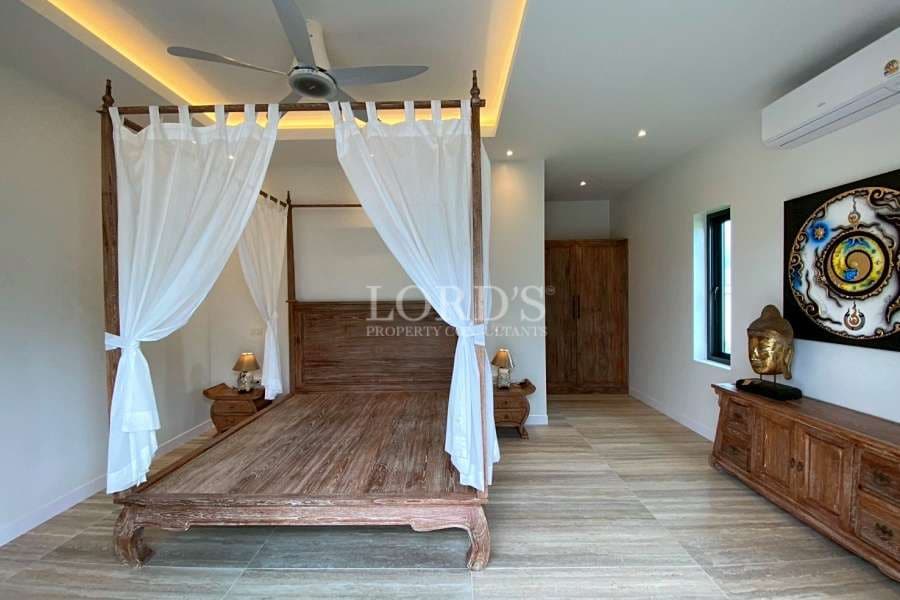 Elegant bedroom with wooden decor