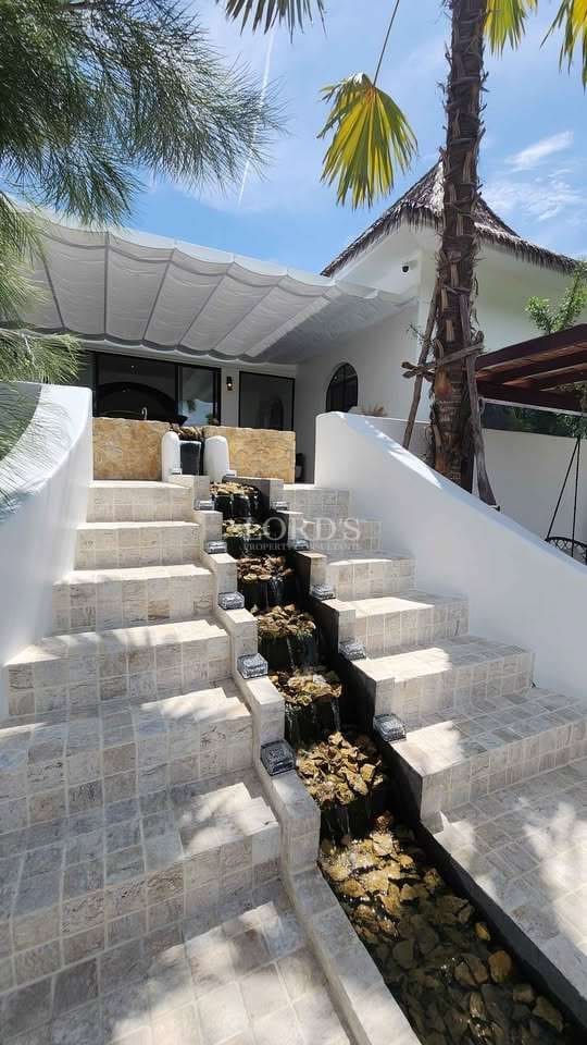 Modern villa with cascading water feature