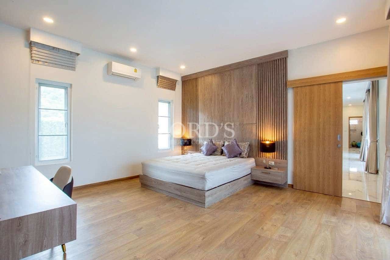 Modern bedroom with wooden accents