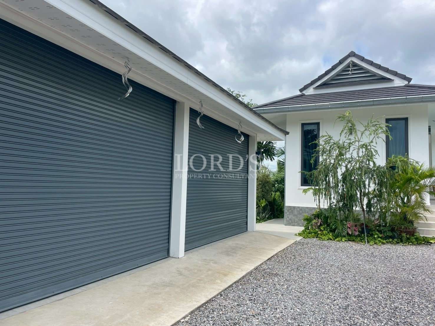 Modern house with garage entrance.