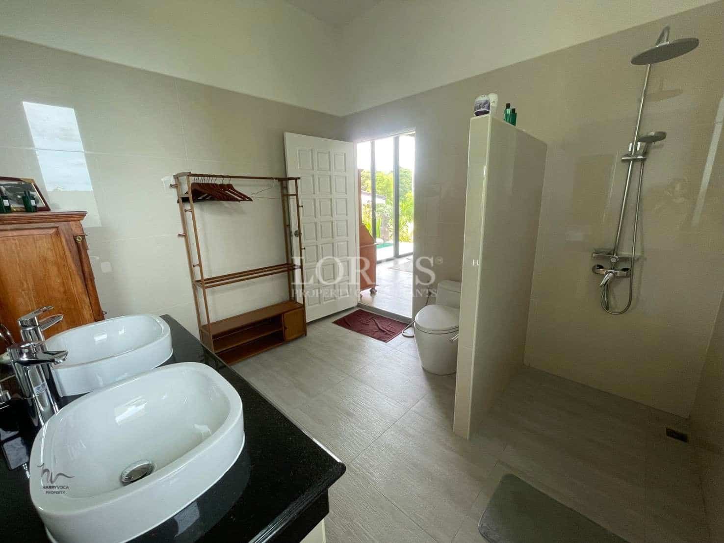Modern bathroom with dual sinks