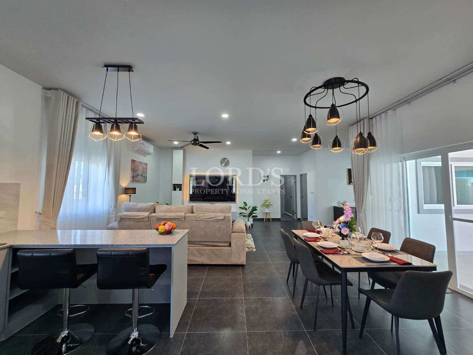 Modern open-concept living and dining area