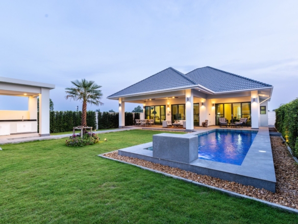 Modern single-storey villa with private swimming pool and landscaped garden